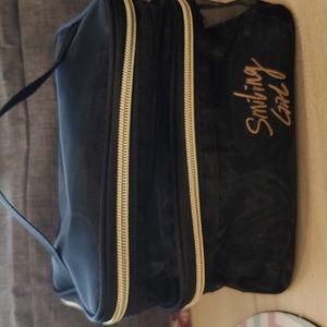 NWOT SHEER COSMETIC BAG (SMILING GIRL)